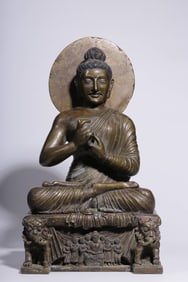 A Qing Dynasty alloy bronze Gandharon top style Buddha statue