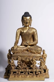 A Qing Dynasty bronze gilt statue of the immovable Buddha