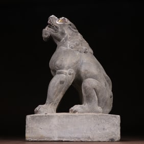 A bluestone inlaid gold and silver lion ornament