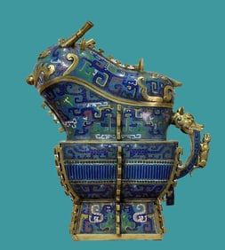 A cloisonné enamel beast-faced knight