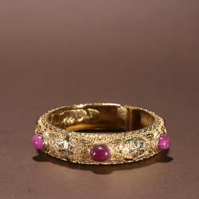 A silver-gilt ruby bracelet