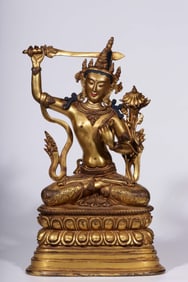 A Qing Dynasty bronze gilt statue of Manjushri Bodhisattva