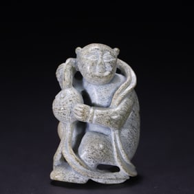 A carving of a high ancient jade boy