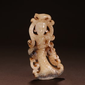 A carving of a tall ancient jade maid
