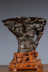 A piece of rosewood figure rafting cup