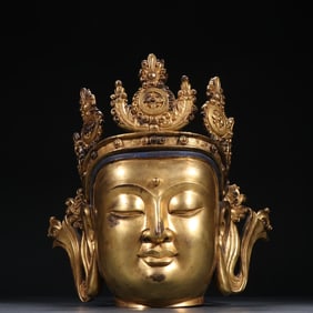 A Ming Dynasty bronze gilt Guanyin head