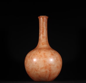 A Qing Dynasty Qianlong stone-glazed long-necked vase