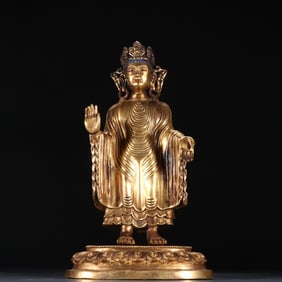 A piece of Qing Dynasty bronze gilt sandalwood Buddha
