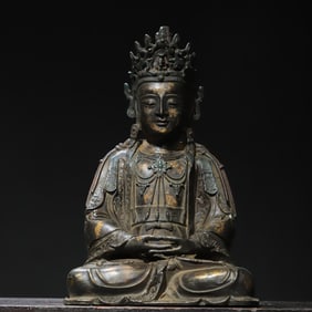 A bronze gold Goddess of Mercy Buddha statue