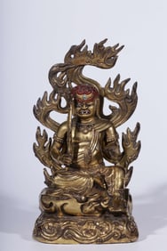 A Qing Dynasty bronze gilt statue of King Fudo Ming