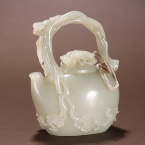 A piece of Qing Hetian jade seed carved plum pattern handle pot