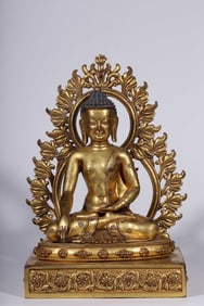 A Qing Dynasty bronze gilt inlaid silver flower immovable Buddha sitting statue