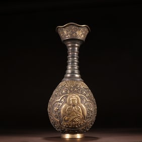 A gilt chisel entwined lotus Buddha pattern vase