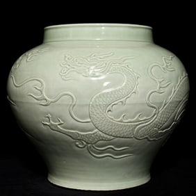 A piece of bright shadow blue glaze carved dragon pattern jar