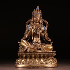 A Qing Dynasty bronze gilt statue of Tara