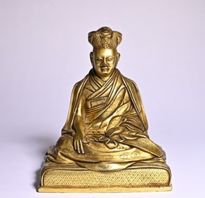 A bronze gilt Tibetan Buddha statue study ornament