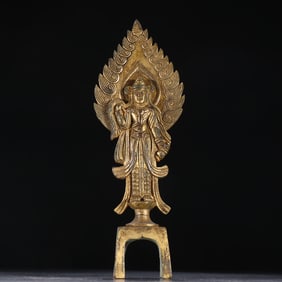 A Northern Wei style bronze gilt bench Buddha