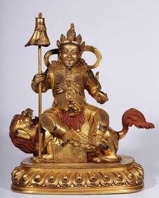 A Qing Dynasty bronze gilt treasure statue of the Heavenly King