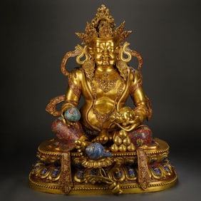 A cloisonné enamel statue of the god of wealth