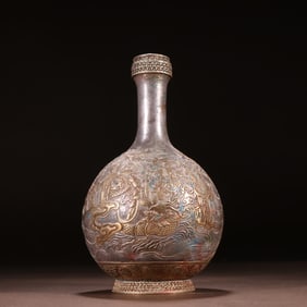 A silver-gilt character story bottle