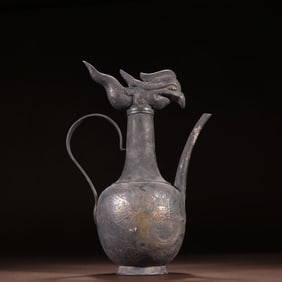 A set of Tang sterling silver gilt phoenix pattern wine jugs