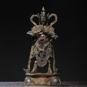 A bronze Tuojin Buddha statue