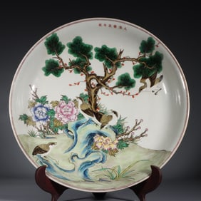 A large plate of flowers and birds in clear pastel