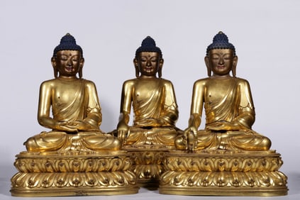 A set of Qing Dynasty bronze gilt III Buddha seated statues