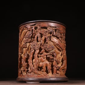 A Qing Dynasty He Qiji style bamboo carving eight immortals picture pen holder
