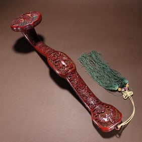 A piece of Qing Dynasty red carved landscape figure Bogutu Ruyi