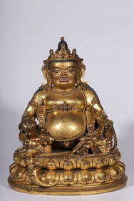 A Qing Dynasty bronze gilt statue of the God of Wealth