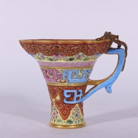 A piece of Qianlong in the Qing Dynasty pastel carved sand red painted gold dragon pattern cup