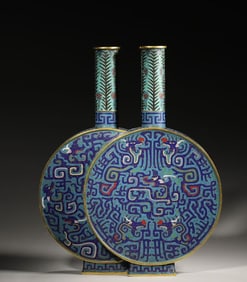 A cloisonné enamel diptych hugging the moon bottle