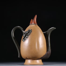An old collection of Jiang Rong's purple sand backflow pot