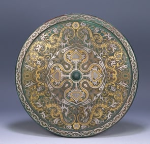 A Han Dynasty wrong gold and silver dragon pattern bronze mirror,