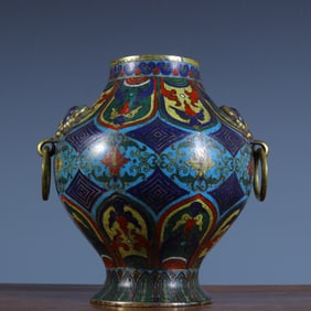 A bronze gilt floral animal ear vase