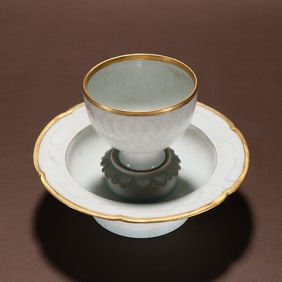 A piece of shadow blue glaze engraved cup