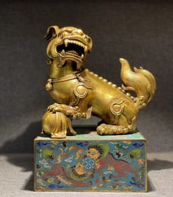 A piece of cloisonné enamel lion print