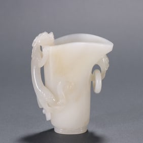 A piece of Qing Hetian jade carved dragon ear cup