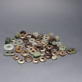 A set of fifty pieces of Hetian Yuhe jade carvings