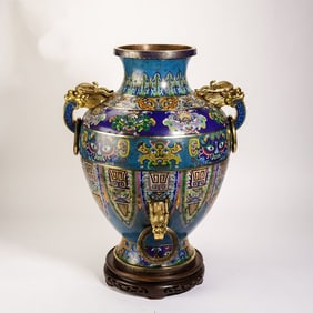 A cloisonné enamel animal ear with ring bottle