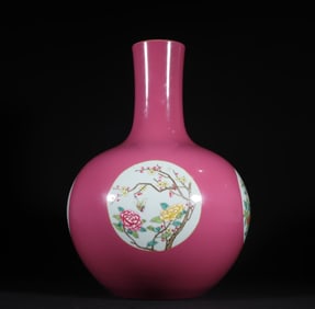 A piece of Qing Dynasty Yongzheng carmine glaze windowed floral pattern celestial globe bottle
