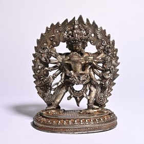 A sterling silver Tibetan Buddha statue study ornament