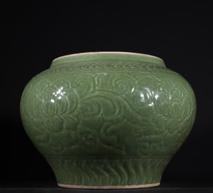 A piece of Yuan Dynasty Longquan kiln carved pot