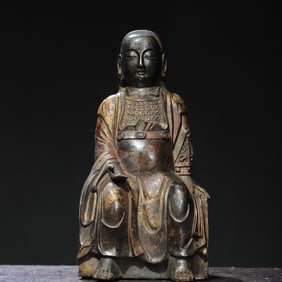 A bronze gold statue of Emperor Zhenwu Buddha