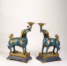 A pair of cloisonné enamel Rui sheep candle holders
