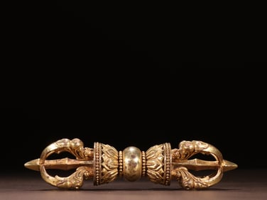 A Qing dynasty bronze gilt four-strand vajra