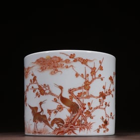 A Qianlong style sail red depiction of gold plum crane poetry pen holder