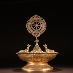 A piece of Qing Dynasty bronze gilt Falun offerings