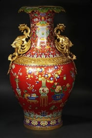 A bronze gilt cloisonné cloisonné enamel vase with double phoenix ears